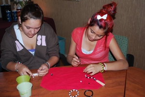 GSBB girls making awareness bracelets.